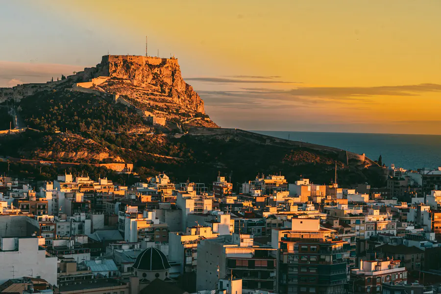 The castle of Santa Bárbara above Alicante's old town at golden hour